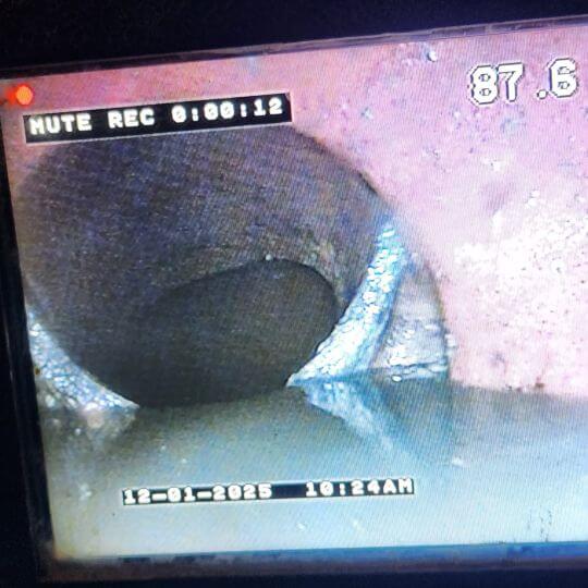 Sewer Video Inspection Dislocated Pipe Screen shot from video inspection of pipe